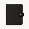 A5 closed black binder with snap closure and gold Day Designer logo