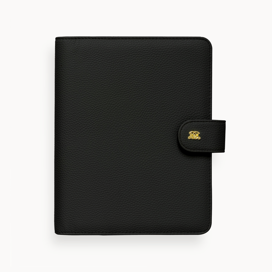 A5 closed black binder with snap closure and gold Day Designer logo