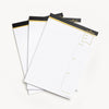 set of three note pad refills with black and gold trim tape for clipfolios