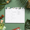 Menu planning pad with green leaf pattern on a green background