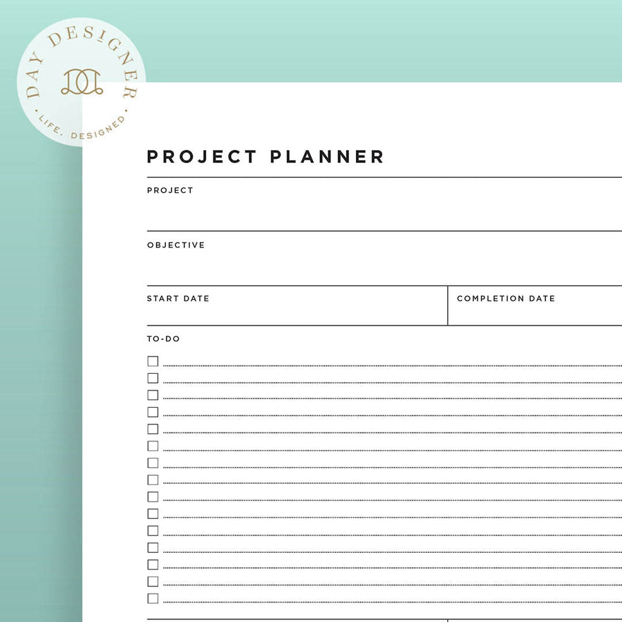 Close up image of project planner printable on a mint background