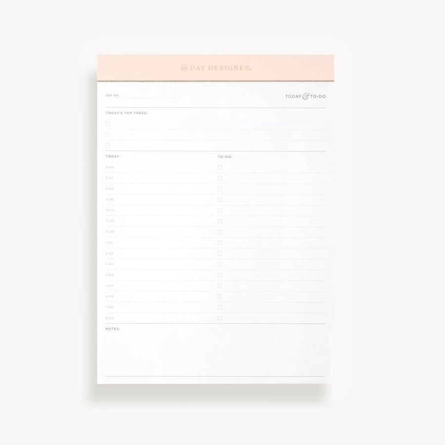 Planning pad with blush pink trim and updated daily planning layout.