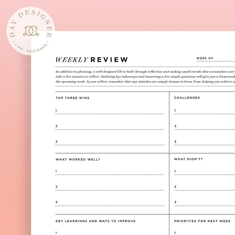 close up Image of weekly review  printable on a pink background