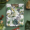 tropical pattern clipfolio with gold clip on a green background