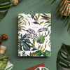 compact tropical patterned notebook on green background