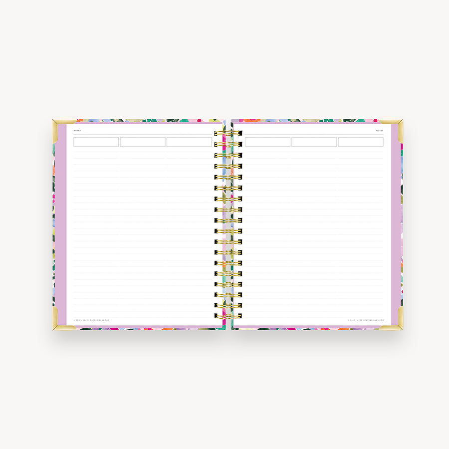 colorful floral notebook open to lined pages