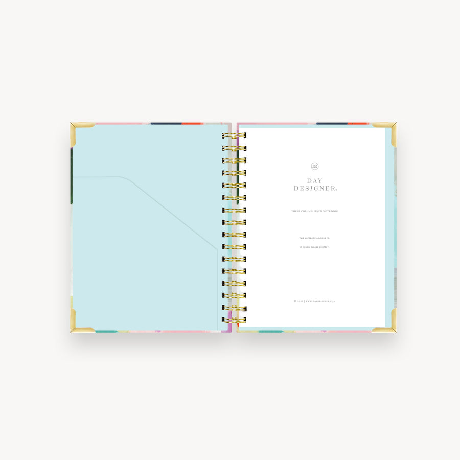 colorful abstract pattern notebook open to show mint liner with pocket