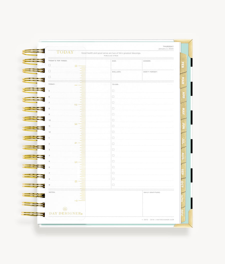 planner open to show clear snap-in ruler with gold type 