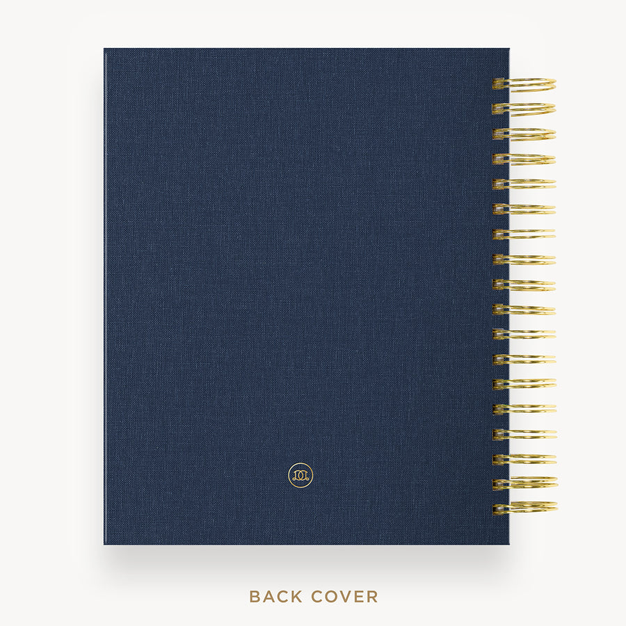 Day Designer 2026 daily planner: navy bookcloth back cover with gold detail