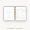 Day Designer 2026 daily planner: navy booklcoth cover with introduction and how to guide