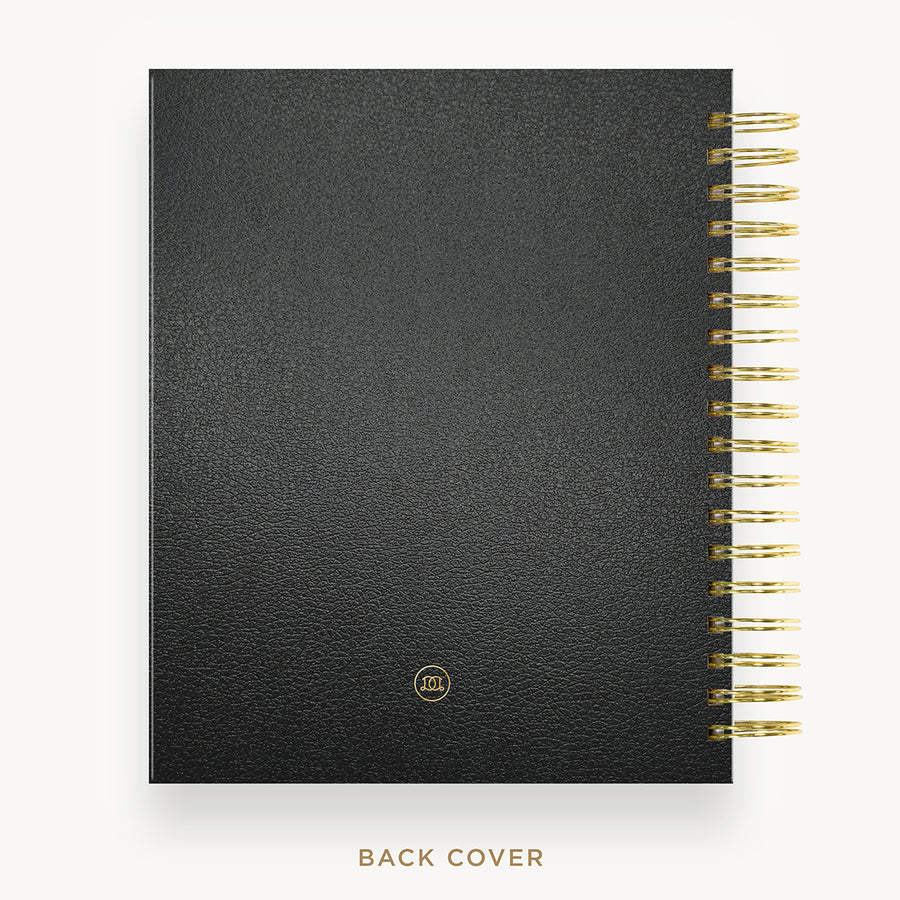 Day Designer 2026 daily planner: classic black pebble texture back cover with gold detail
