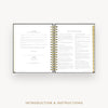Day Designer 2026 daily planner: classic black pebble texture cover with introduction and how to guide