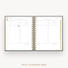 Day Designer 2026 mini daily planner: classic black pebble texture cover with daily planning page