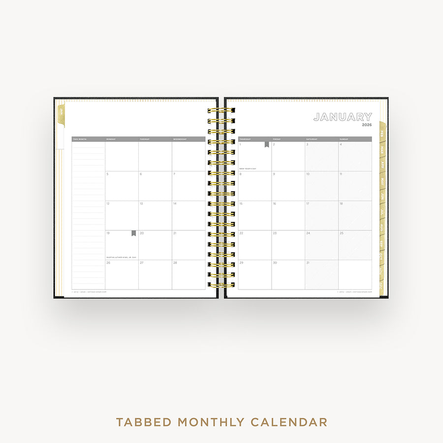 Day Designer 2026 weekly planner: classic black pebble texture cover with monthly calendar