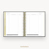 Day Designer 2026 mini weekly planner: classic black pebble texture cover with expense tracking pages