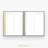 Day Designer 2026 mini weekly planner: classic black pebble texture cover with favorite books and movies pages
