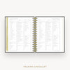 Day Designer 2026 mini weekly planner: classic black pebble texture cover with packing checklist