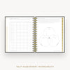 Day Designer 2026 mini weekly planner: classic black pebble texture cover with self assessment worksheet
