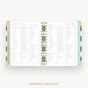 Day Designer 2026 weekly planner: black stripe cover with packing checklist