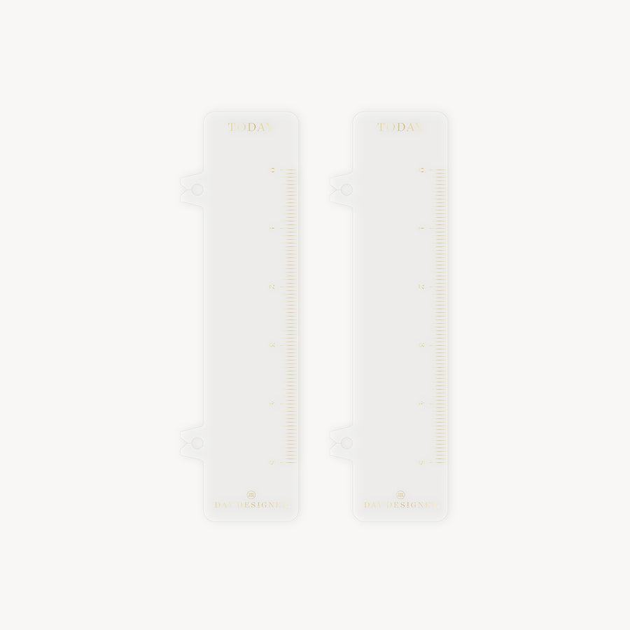 Three pairs of socks with a subtle pattern on a white background