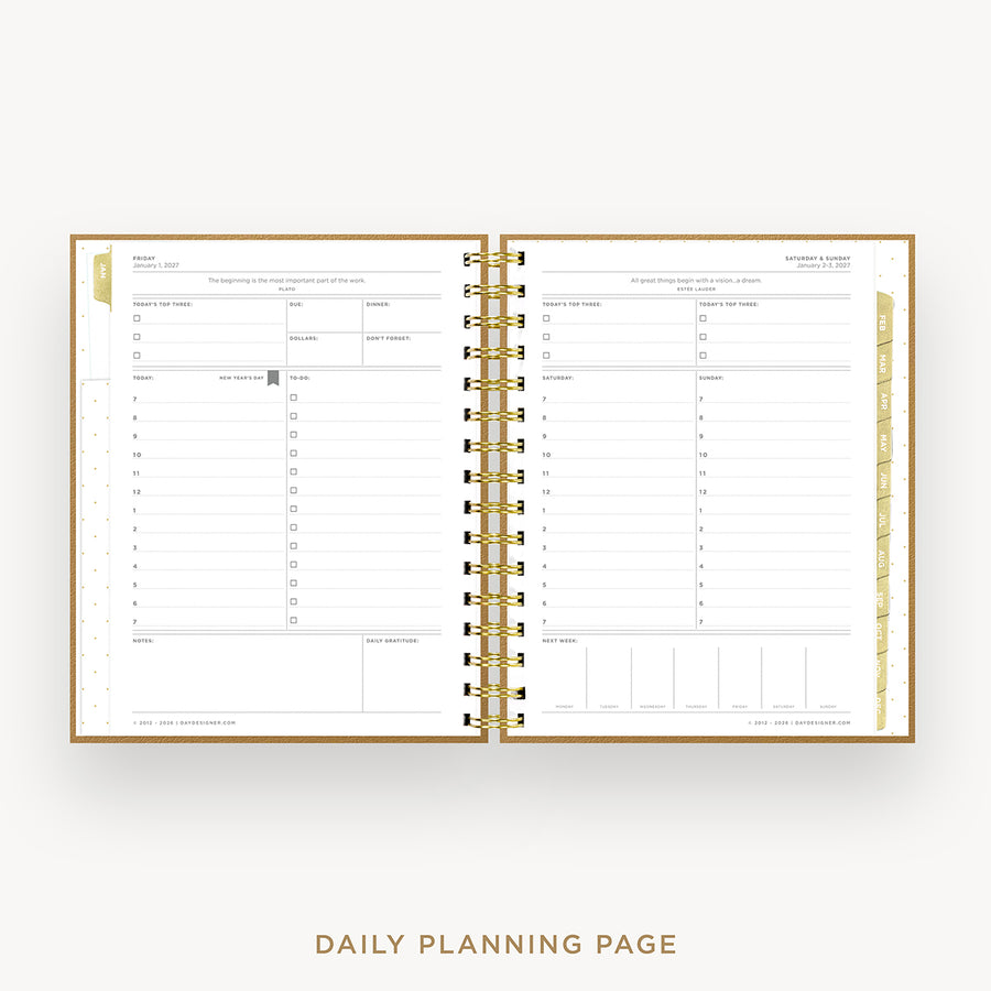 An open spiral-bound daily planner showing two lined daily planning pages with gold-toned binding and gold page edges, centered on a light gray background with the text 'DAILY PLANNING PAGE' below.