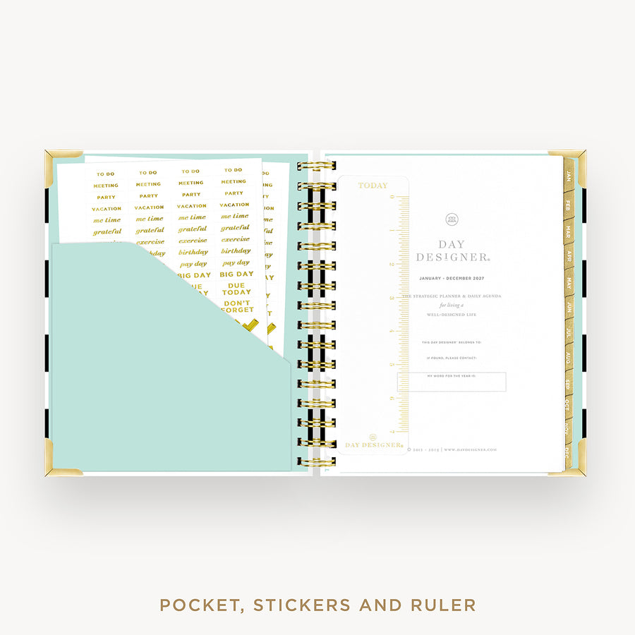 An open pocket organizer planner with gold spiral rings, featuring mint green pocket sheets, gold sticker sheets, and a white 'Day Designer' page with a ruler, shown on a light gray background with text reading 'POCKET, STICKERS AND RULER' below.