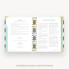 An open spiral-bound booklet or planner showing printed introduction and instructions pages, centered on a light gray background with the text 'INTRODUCTION & INSTRUCTIONS' below.