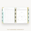 An open spiral-bound workbook showing self-assessment worksheet pages, including a checklist on the left and a Venn diagram on the right, with gold rings and a light aqua accent tab, photographed on a light gray background.