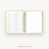 An open spiral-bound planner or agenda with white pages, shown on a light gray background. The cover has a subtle yellow floral pattern, and the text 'IMPORTANT DATES' appears below the product.