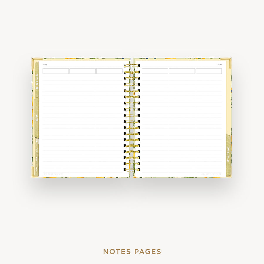 An open spiral-bound planner or notebook with lined white pages, shown against a light gray background. The cover has a subtle yellow and green floral pattern, and the pages are labeled 'NOTES PAGES' below.