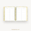 An open spiral-bound planner or agenda showing a favorites list page spread, with a gold-toned floral-patterned cover and gold wire binding on a light gray background. The words 'FAVORITES LIST' appear below the product.