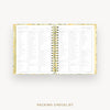An open spiral-bound Packing Checklist planner shown from above on a light gray background, with the words 'PACKING CHECKLIST' printed below.