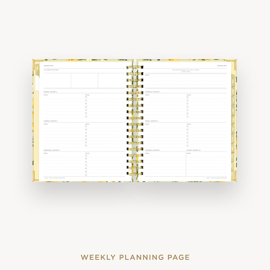 An open spiral-bound weekly planner with white pages, gold-toned binding, and a subtle floral patterned cover, shown on a light gray background with the text 'WEEKLY PLANNING PAGE' below.