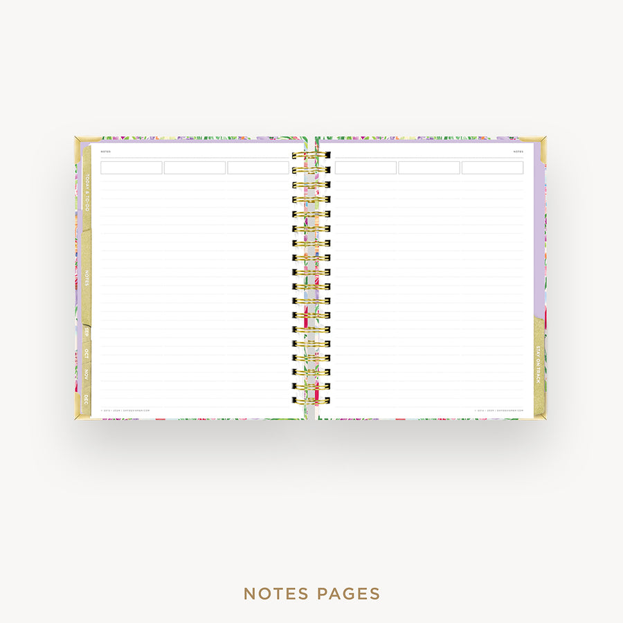 An open spiral-bound planner or notebook with lined white pages, shown on a light gray background. The cover has a delicate pastel floral border, and the text 'NOTES PAGES' appears below.