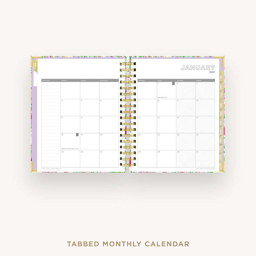 An open spiral-bound monthly calendar planner on a light gray background, showing a January 2027 calendar spread with tabs and the text 'JANUARY 2027' and 'TABBED MONTHLY CALENDAR' below.