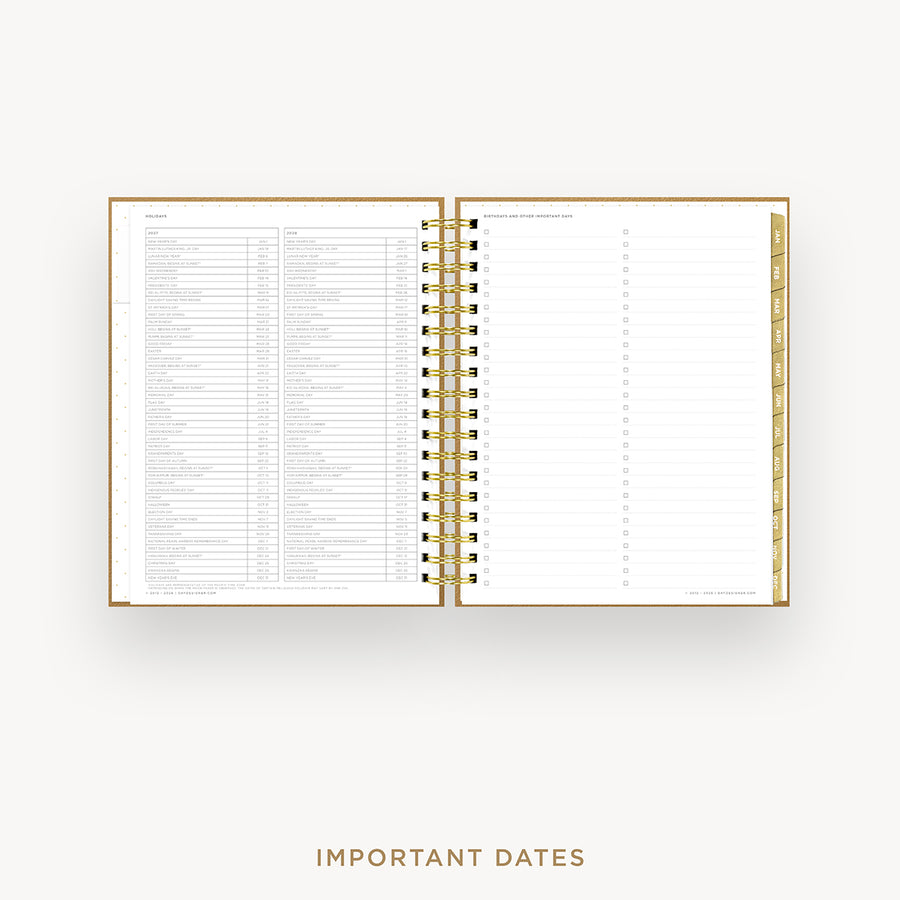 An open spiral-bound planner or agenda with white pages, gold binding, and gold page edges, showing a detailed calendar-style table on the left page and lined notes on the right. The words 'IMPORTANT DATES' appear below on a light gray background.
