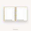 An open spiral-bound planner showing the Expenses page with lined columns, gold-toned binding, and a gold vertical tab on the left, centered on a light gray background with the word EXPENSES below.