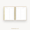 An open spiral-bound planner or agenda showing a favorites list page layout, with gold-toned rings and a gold vertical tab on the left page, set on a light gray background with the words 'FAVORITES LIST' below.