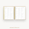 An open spiral-bound planner or notebook showing a packing checklist page spread across both pages, with gold rings and a gold vertical tab on the left. The text 'PACKING CHECKLIST' appears below on a light gray background.
