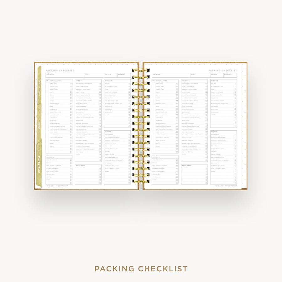 An open spiral-bound planner or notebook showing a packing checklist page spread across both pages, with gold rings and a gold vertical tab on the left. The text 'PACKING CHECKLIST' appears below on a light gray background.