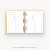 An open spiral-bound planner or checklist book showing two printed interior pages titled 'ENTERTAINMENT CHECKLIST' on a light gray background, with the same title printed below.