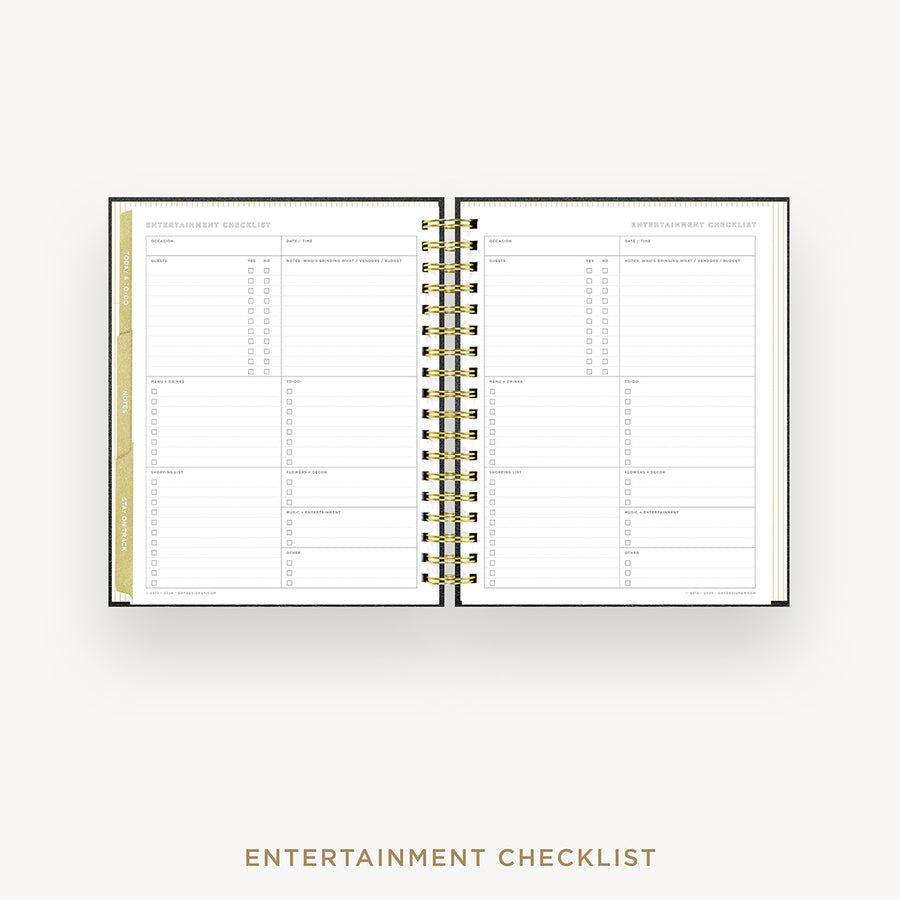 An open spiral-bound planner showing two pages of an Entertainment Checklist layout, photographed on a light gray background with the text 'ENTERTAINMENT CHECKLIST' below.