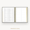An open spiral-bound planner or agenda showing a detailed monthly calendar page with columns for dates and notes, plus a gold-toned vertical tab on the right. The pages are white with fine gray text, and the product is photographed on a light neutral background with the words 'IMPORTANT DATES' below.
