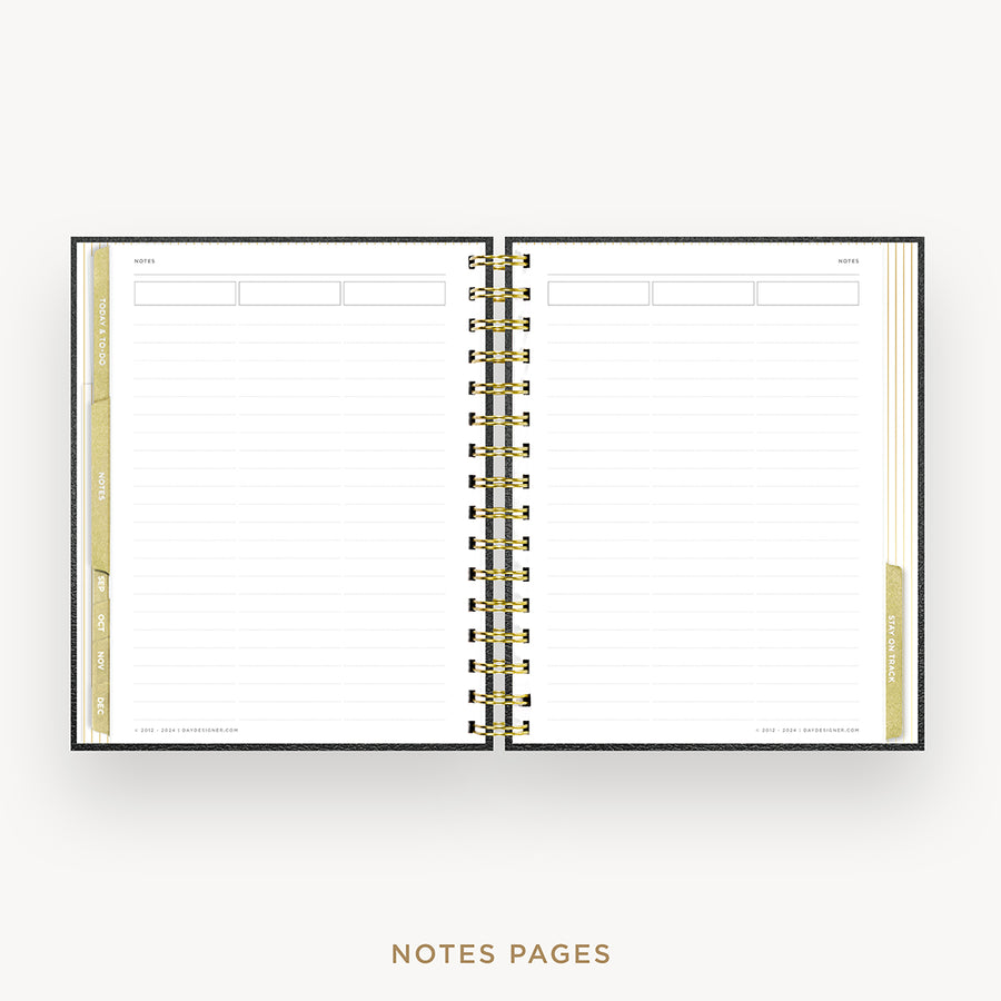 An open spiral-bound planner or notebook showing lined notes pages with gold and black accents, centered on a light gray background with the text 'NOTES PAGES' below.