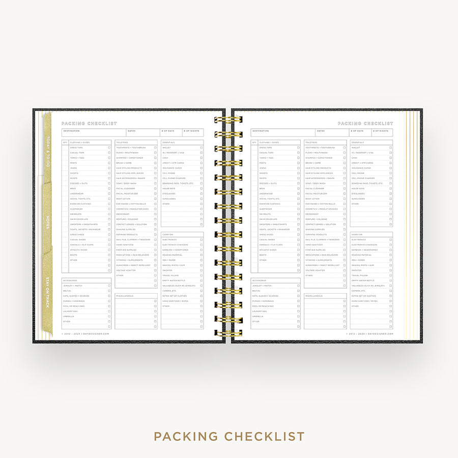 An open spiral-bound planner or notebook showing two printed pages with packing checklist tables, centered on a light gray background with the text 'PACKING CHECKLIST' below.