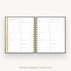 An open spiral-bound planner or checklist book showing two printed pages titled 'ENTERTAINMENT CHECKLIST' with lined sections and tabs, photographed on a light gray background with the title printed below.