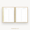 An open spiral-bound planner or notebook showing two lined pages titled 'FAVORITES LIST' on a light gray background, with the same title printed below.