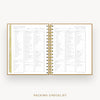 An open spiral-bound planner or notebook showing two printed checklist pages titled 'Packing Checklist,' with gold rings and a light beige cover visible on a clean white background. Text below reads 'Packing Checklist.