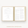 An open spiral-bound booklet with gold rings and printed pages titled 'Introduction & Instructions,' shown on a light gray background.
