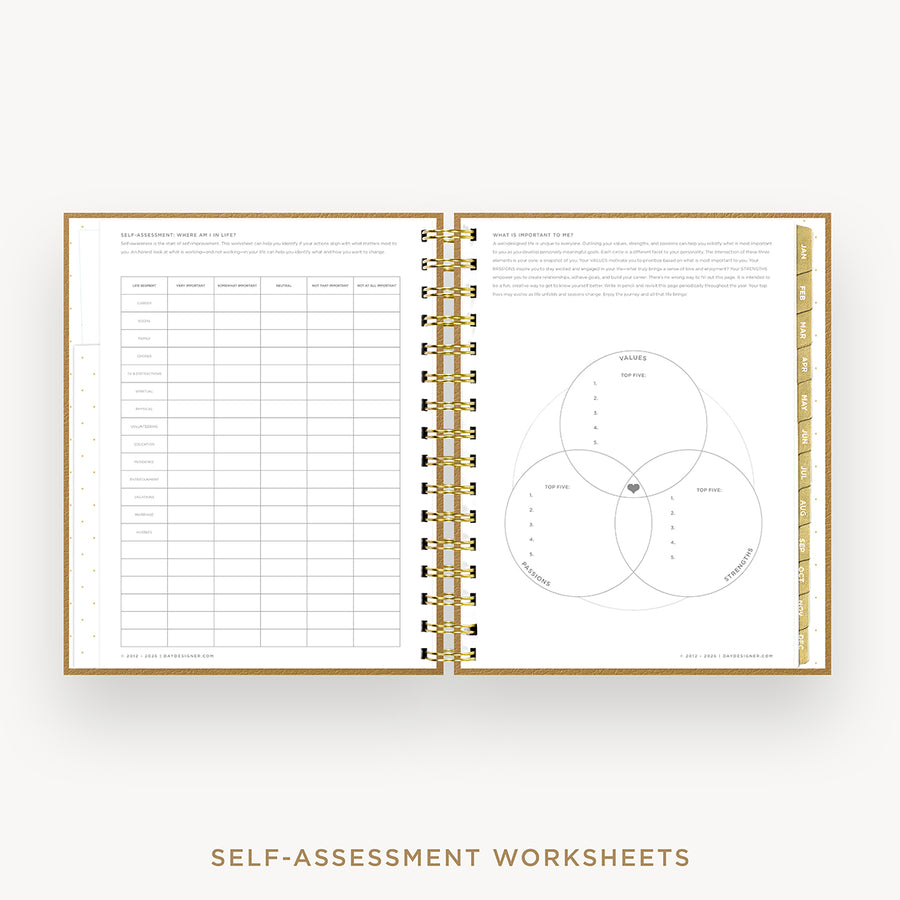 An open spiral-bound workbook showing self-assessment worksheet pages, including a table on the left and a Venn diagram on the right, with gold rings and a gold border. The text 'SELF-ASSESSMENT WORKSHEETS' appears below on a light background.